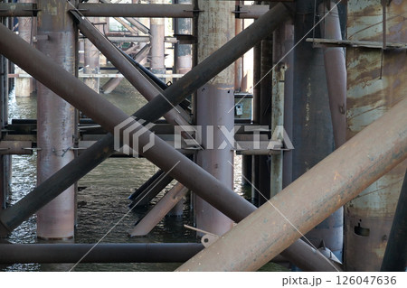 Temporary metal supports of the bridge under construction Temporary metal supports of the bridge under construction 126047636