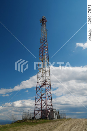 Big metal tower on blue background 126047671