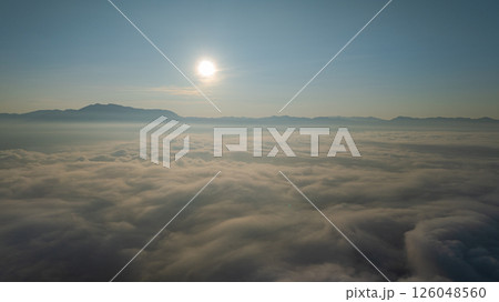 Aerial view of the sea of mist cover the mountain at beautiful sunrise Aerial view of the sea of mist cover the mountain at beautiful sunrise 126048560