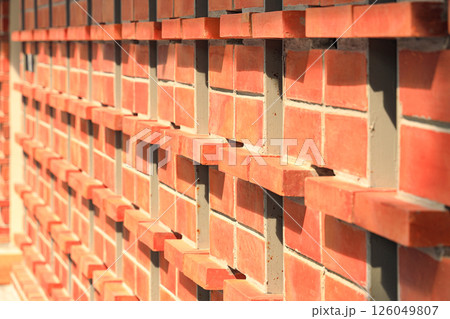 Perspective brick wall, wide panorama of masonry, bricklaying texture background. Perspective brick wall, wide panorama of masonry, bricklaying texture background. 126049807
