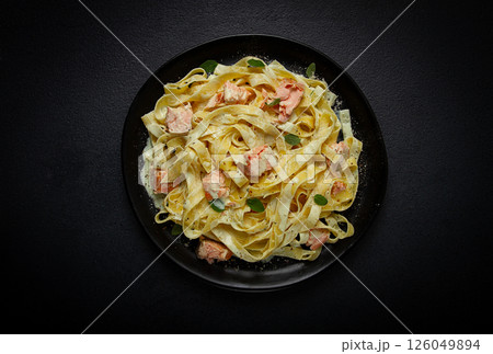 tagliatelle pasta, in cream sauce with salmon, homemade, no people, 126049894