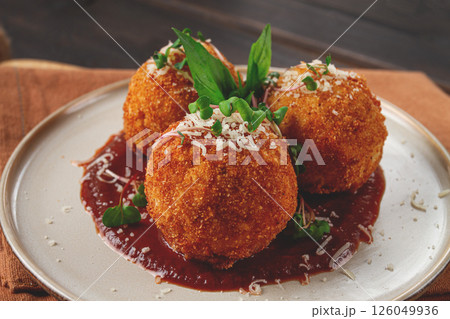 Crispy Arancini appetizer, with parmesan cheese and microgreens, plate, tomato sauce, homemade, no people, Crispy Arancini appetizer, with parmesan cheese and microgreens, plate, tomato sauce, homemade, no people, 126049936