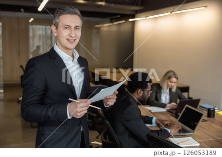 Business consultants working together in the office Business consultants working together in the office 126053189