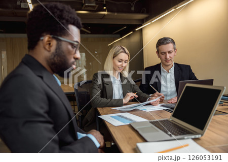 Business consultants working together in the office Business consultants working together in the office 126053191