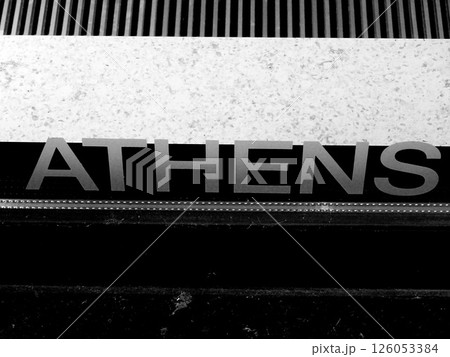 torn poster on a street sign 126053384