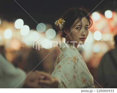 恋人との浴衣を着て夏祭りデート 126060433