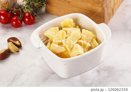 Crushed parmesan cheese in the bowl Crushed parmesan cheese in the bowl 126062359