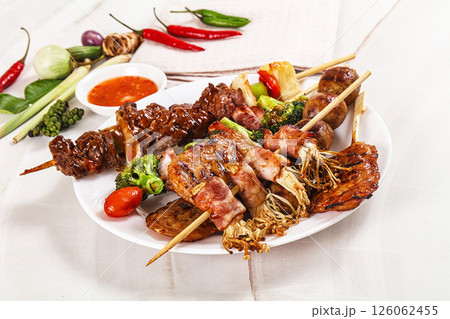 Asian grilled skewer assortment satay 126062455