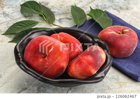 Ripe sweet and juicy Flat peach Ripe sweet and juicy Flat peach 126062467