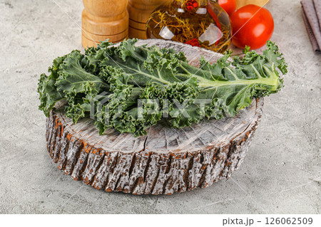 Green Kale cabbage leaves ocer board 126062509
