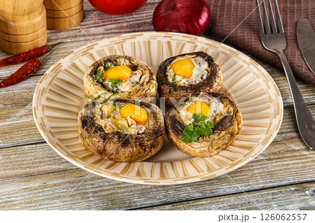 Baked champignon with quail egg Baked champignon with quail egg 126062557