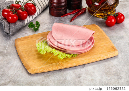 Sliced boiled sausage over board Sliced boiled sausage over board 126062581