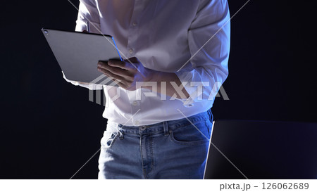 People working together and sharing ideas in a modern business environment. 126062689