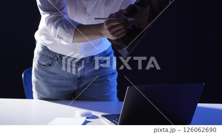 People working together and sharing ideas in a modern business environment. 126062690