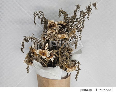Dried flower bouquet with brown paper bag 126062881