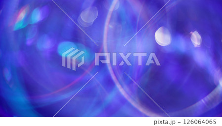 Swirling circle. Blurred shiny glow. Multicolored blue pink circles lens flare on bokeh light kaleidoscope modern background. 126064065