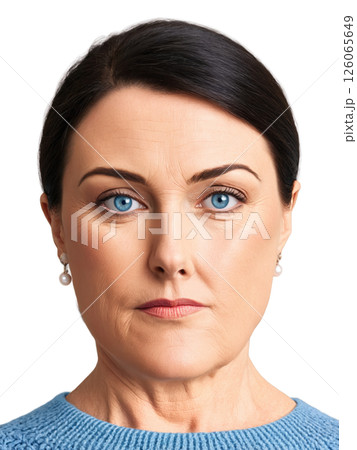 Middle-aged woman with straight dark hair and light blue eyes, a thoughtful look. She wears a cozy sweater and simple 126065649