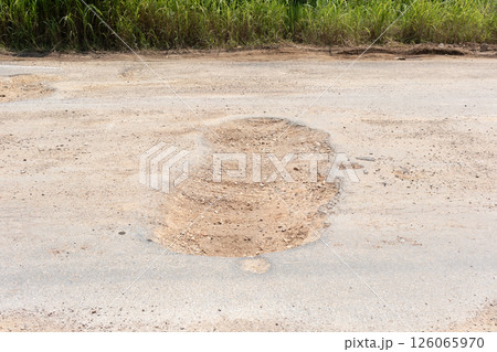 Asphalt road surface crack or damage. Asphalt road surface crack or damage. 126065970