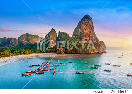Railay beach with long tail boat in Krabi, Thailand. Railay beach with long tail boat in Krabi, Thailand. 126066614