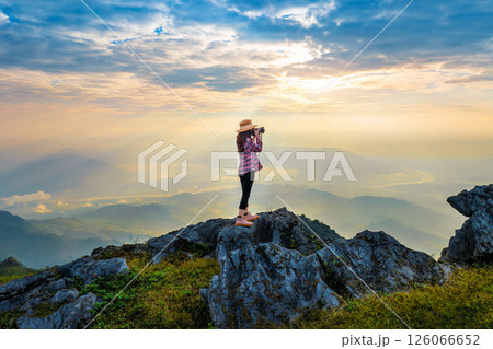 Tourist taking photography and enjoy nature panoramic landscape at Doi pha mon mountains in Chiang rai, Thailand. 126066652