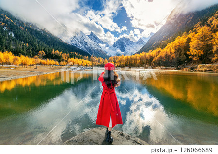 Tourist taking photo of Bipenggou in autumn, Chengdu in China. 126066689