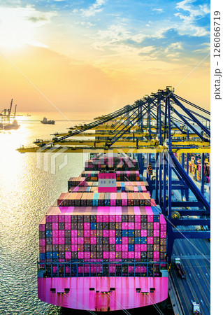 Cargo ship and cargo container in harbor. Cargo ship and cargo container in harbor. 126066719