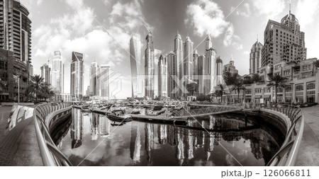 Skyscrapers and bridge over water, black and white style, city background, Dubai Marina bay UAE 126066811