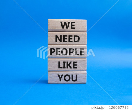 Hiring symbol. Wooden blocks with words We need People like You. Beautiful blue background. Business and Hiring concept. Copy space. 126067753