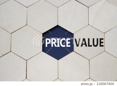 Price and Value symbol. Concept word Price and Value on wooden comb puzzle. Beautiful deep blue background. Business and Price and Value concept. Copy space 126067800