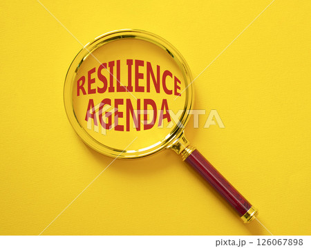Resilience agenda symbol. Magnifying glass with words Resilience agenda. Beautiful yellow background. Business and Resilience agenda concept. Copy space. Resilience agenda symbol. Magnifying glass with words Resilience agenda. Beautiful yellow background. Business and Resilience agenda concept. Copy space. 126067898