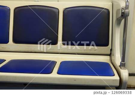 Blue Upholstered Seats on Public Transit Enhancing Comfort and Style in Urban Transportation Blue Upholstered Seats on Public Transit Enhancing Comfort and Style in Urban Transportation 126069338