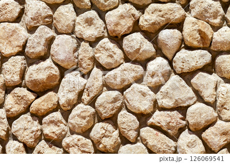 Wall made of cobblestones, close up 126069541