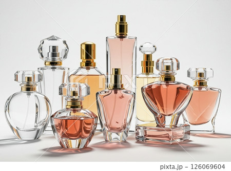 Elegant Luxury Perfume Collection mockup with Crystal Caps and Gold Accents in Warm Pastel Tones on Minimalist Background 126069604