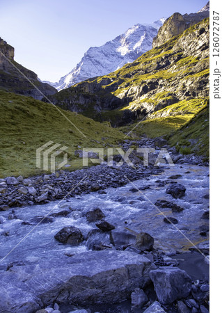 Switzerland Mountain valley Kiental, Berner Oberland Alps. Snow mountains, sunny weather, travel to Swiss. 126072787