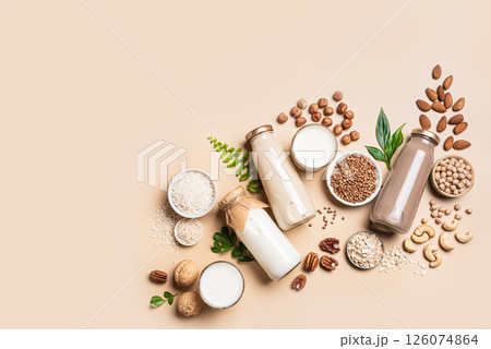 Various vegan plant based milk bottles and ingredients, lactose free drink Various vegan plant based milk bottles and ingredients, lactose free drink 126074864
