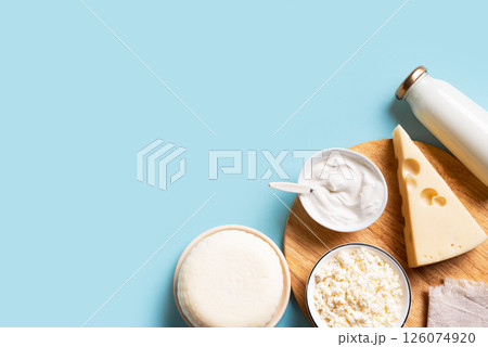 Fresh dairy products on blue background 126074920