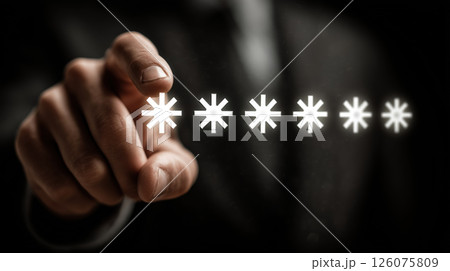 Businessman hand pointing glowing asterisks, password security concept, dark background 126075809