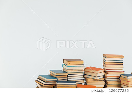 Stacks of educational books for learning on a white background Stacks of educational books for learning on a white background 126077286