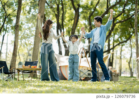 Happy asian family picnic in park, weekend lifestyle outdoors. 126079736