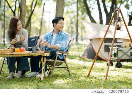 Happy asian family picnic in park, weekend lifestyle outdoors. 126079739