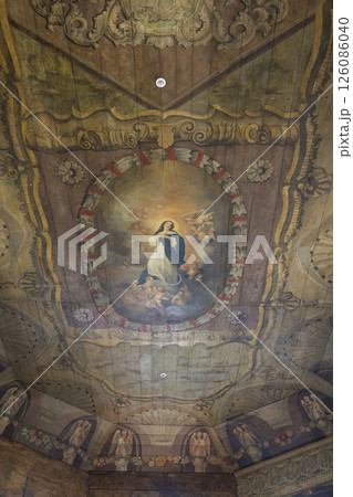 Assumption of mary painting decorating the wooden ceiling of the church of saint michael the archangel in Haczow, Poland Assumption of mary painting decorating the wooden ceiling of the church of saint michael the archangel in Haczow, Poland 126086040