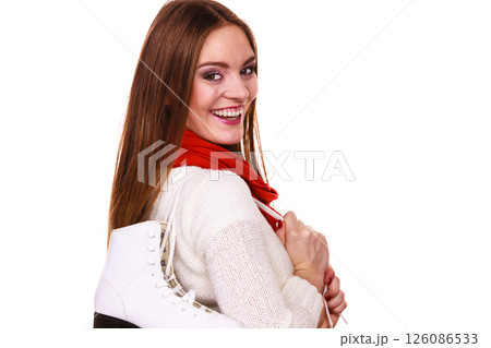 Attractive girl with ice skates. Attractive girl with ice skates. 126086533