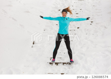 Girl enjoying winter time. 126086574