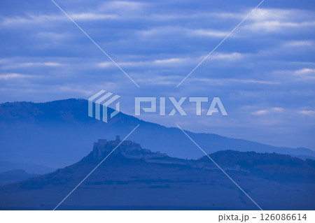 Majestic Spis Castle Surrounded by Misty Mountains Majestic Spis Castle Surrounded by Misty Mountains 126086614
