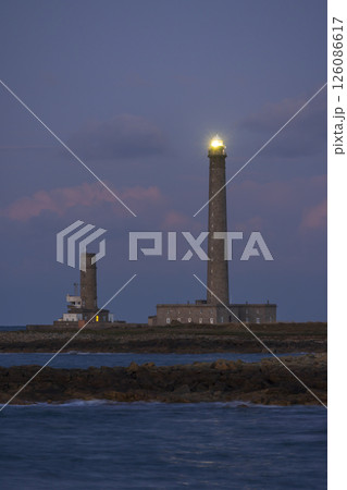 Lighthouse glowing at dusk in Gatteville le Phare, Normandy Lighthouse glowing at dusk in Gatteville le Phare, Normandy 126086617