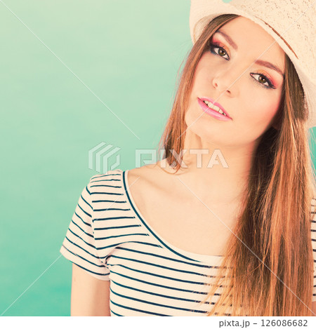 Attractive tourist girl in straw hat. Attractive tourist girl in straw hat. 126086682