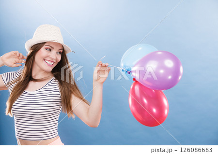 Woman summer joyful girl with colorful balloons 126086683