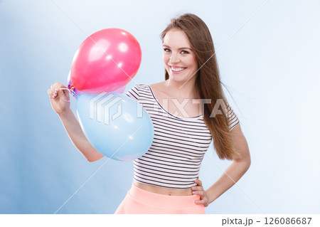 Woman summer joyful girl with colorful balloons Woman summer joyful girl with colorful balloons 126086687