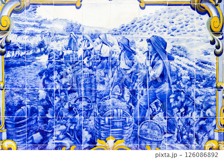 Blue azulejos with motifs from Douro Valley, train station of Pinhao, Portugal Blue azulejos with motifs from Douro Valley, train station of Pinhao, Portugal 126086892