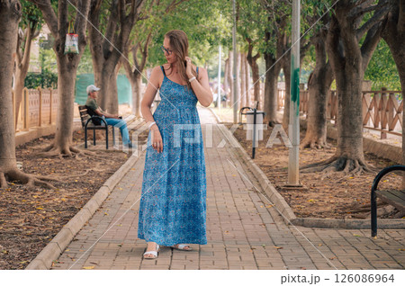 Woman sits on the bench in Alanya city 126086964